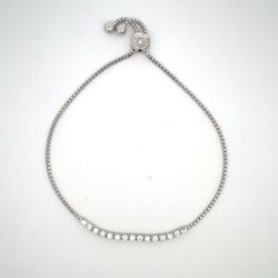 Bolo style bracelet with basket prong set (15) round diamonds.  D0.50ct.t.w.
