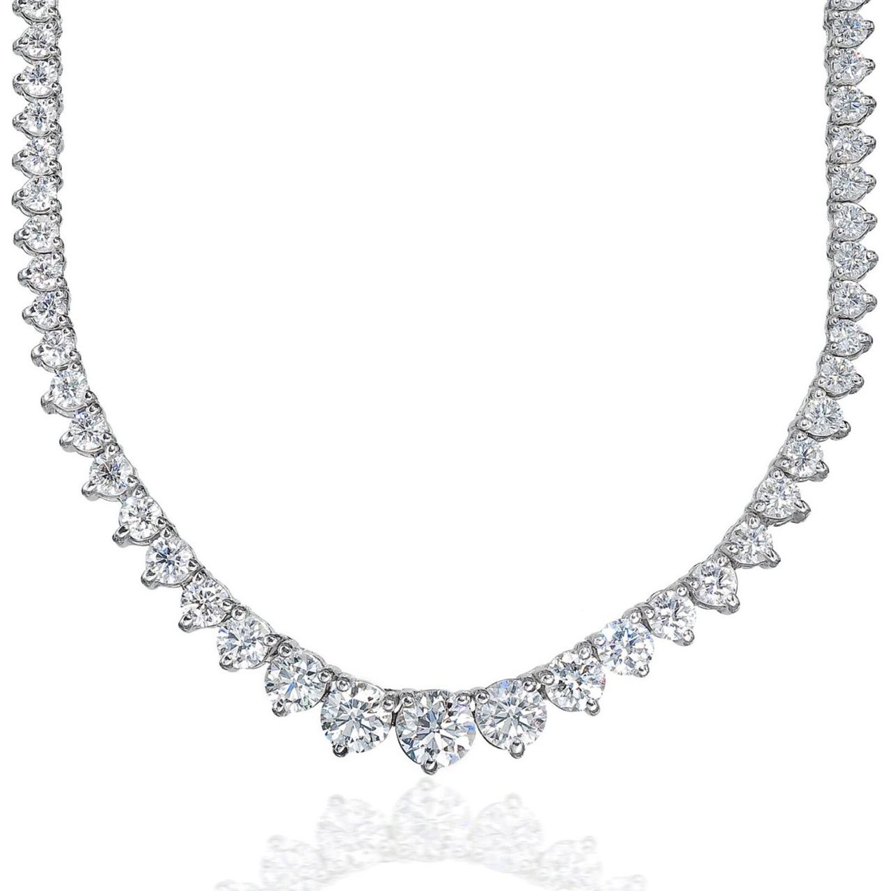 16' Graduating tennis necklace in 18K WG with 3-prong set round diamonds.  D8.13ct.t.w.  (Center 0.56ct.)