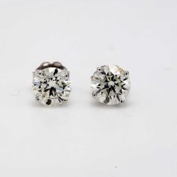 Screw back stud earrings with 4-prong set round diamonds.  D1.80ct.t.w.