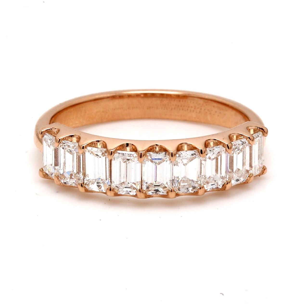9-stone band in 18K RG with U-prong set emerald cut diamonds.  D0.99ct.t.w.  Size 5.25