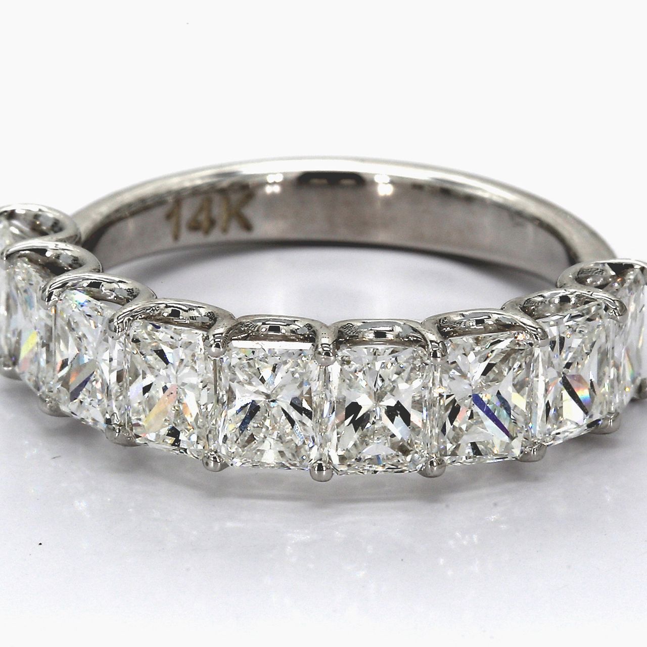 9-stone band with U-prong set radiant cut diamonds.  D3.71ct.t.w.  Size 8