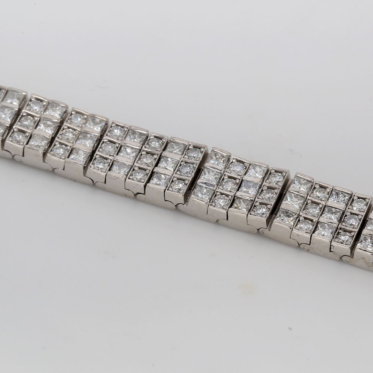 7' 3-row tennis bracelet with prong set round and princess cut diamonds.  D8.14ct.t.w.