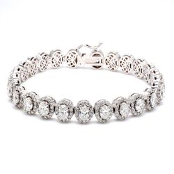 7' Designer halo bracelet in 18K WG with prong set rounds & 4-prong set oval diamonds.  D11.60ct.t.w.