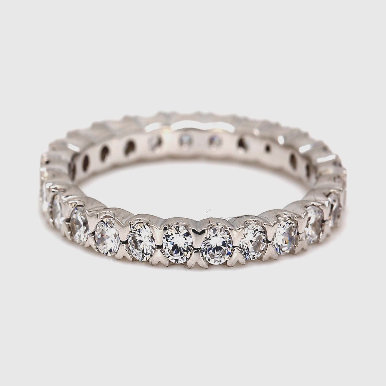 Eternity band with prong set (25) round diamonds.  D1.00ct.t.w.  Size 6