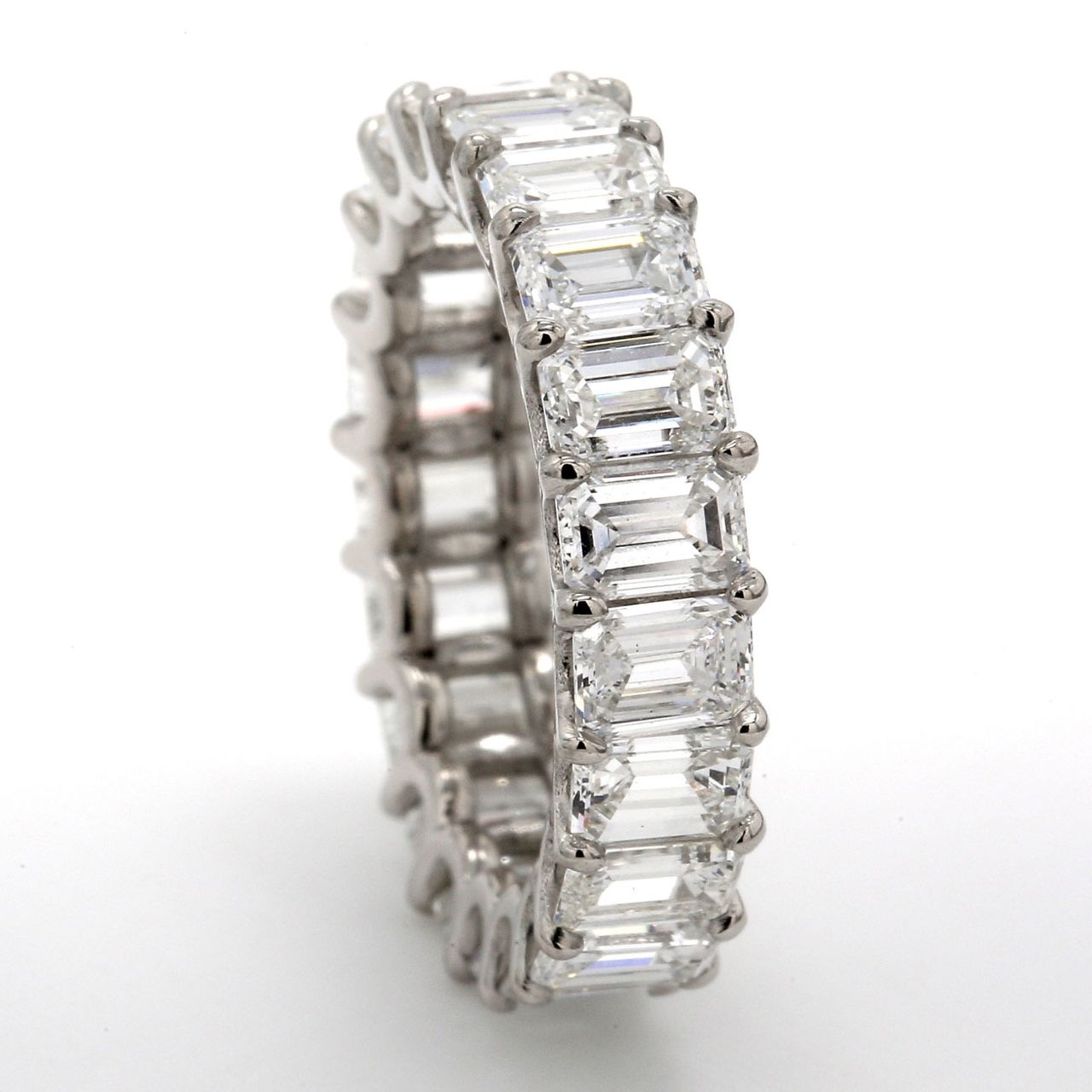 Eternity band in platinum with U-prong set (22) emerald cut diamonds.  D5.44ct.t.w.  Size 5