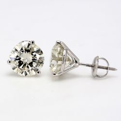 Screw back martini style stud earrings with 3-prong set USA certified K-L/SI2-SI3 round diamonds.  D4.67ct.t.w.