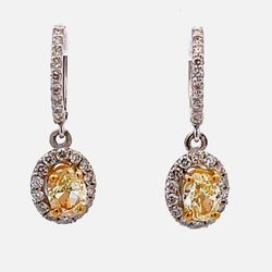 Halo dangling earrings with FY/VS2-SI1 oval diamond centers.  D 2.37ct.t.w.  (Center - 1.70ct.t.w.)