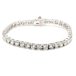 7' Tennis bracelet with basket prong set (44) round diamonds.  D11.91ct.t.w.