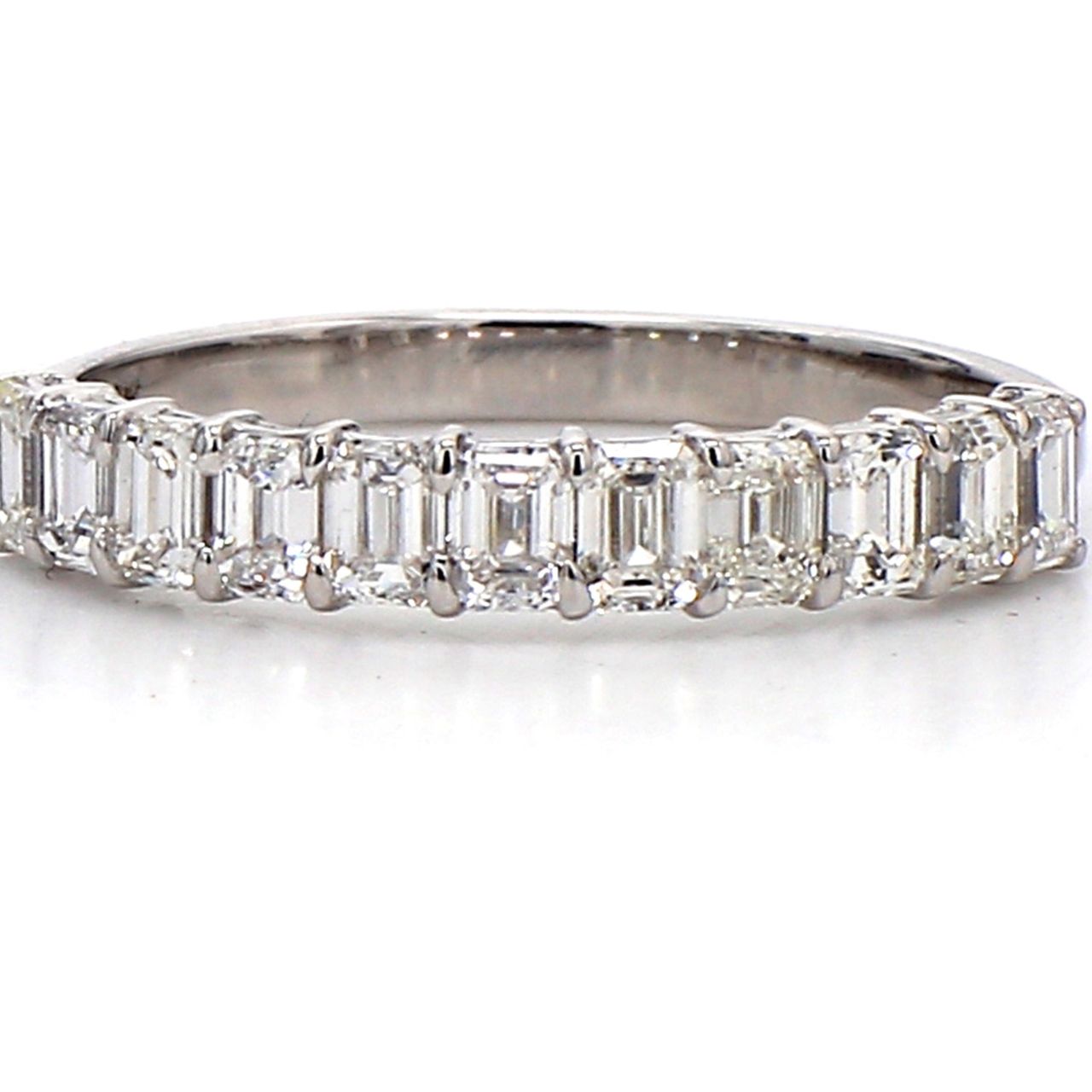 11-stone band with basket prong set emerald cut diamonds.  D1.03ct.t.w.  Size 6.25