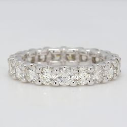 Eternity band in platinum with U-prong set (19) round diamonds.  D2.26ct.t.w.  Size 4