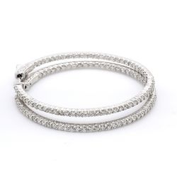 2.5' Inside out hoop earrings with shared prong set G/VS2-SI1 round diamonds.  D2.92ct.t.w.