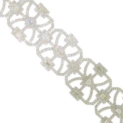 Halo designer bracelet in 18K WG with French pave set rounds around prong set fancy shaped diamond center stones.  D10.17ct.t.w.