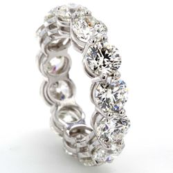 Eternity band in platinum with shared prong set (13) round diamonds.  D9.26ct.t.w.  Size 7.25