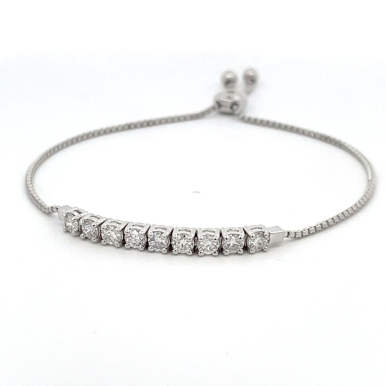 Bolo style bracelet with prong set round diamonds.  D1.12ct.t.w.