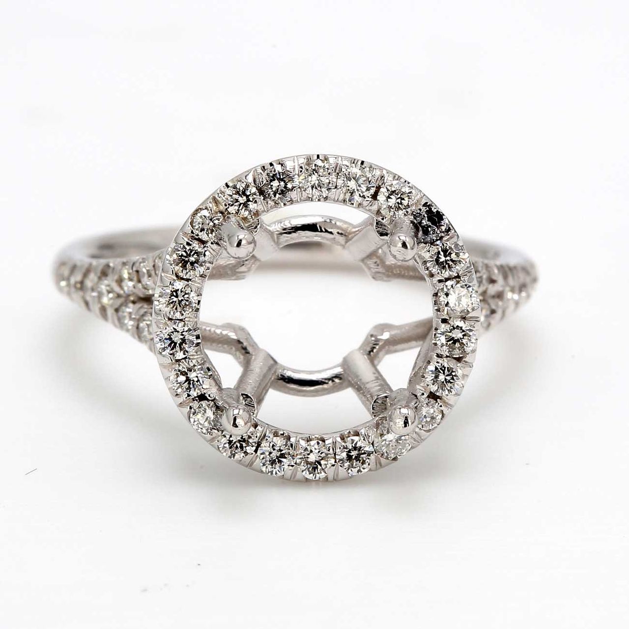 Halo split shank semi-mount with shared prong set round diamonds.  D0.45ct.t.w.