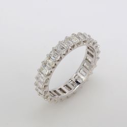 Eternity band with U-prong set emerald cut diamonds.  D2.76ct.t.w.  Size 6
