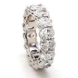 Eternity band in platinum with shared prong set oval diamonds.  D4.02ct.t.w.