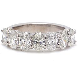 7-stone band in platinum with basket prong set oval cut diamonds.  D1.85ct.t.w.  Size 5.5