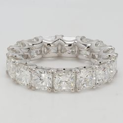 Eternity band with U-prong set (19) cushion cut diamonds.  D6.02ct.t.w.  Size 6.5