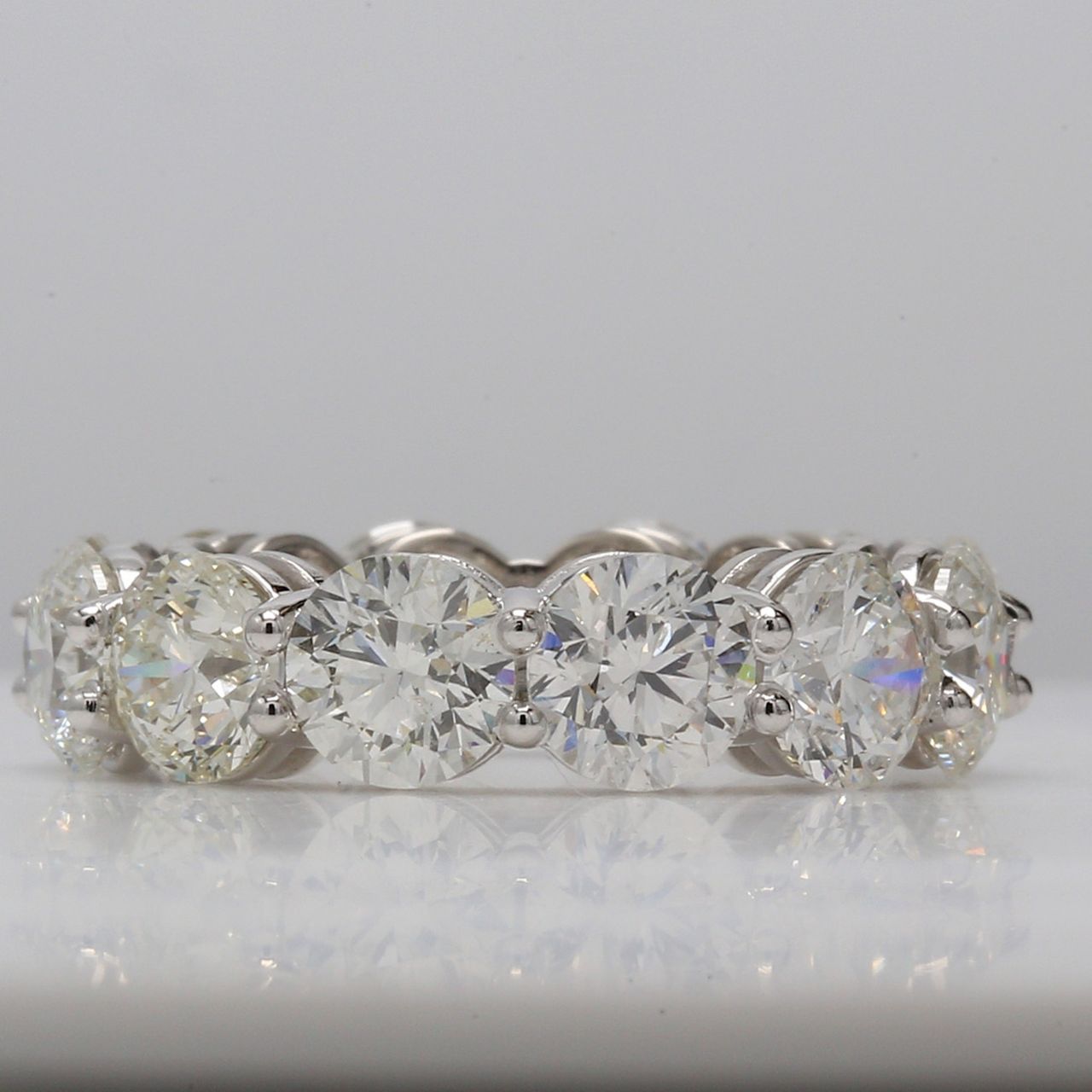 Eternity band in platinum with shared prong set (12) round diamonds.  D8.70ct.t.w.  Size 5.25