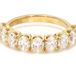 9-stone band in 18K YG with prong set oval cut diamonds.  D2.10ct.t.w.  Size 6.25