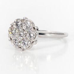 Cluster-style ring with prong-set (7) round diamonds.  D1.50ct.t.w.