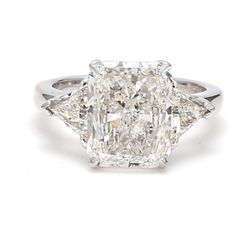 3-stone semi-mount in platinum with trilliant cut diamond sides.  D0.92ct.t.w.