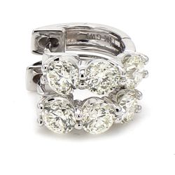 0.50' Huggy earrings with shared prong set (6) round diamonds.  D1.76ct.t.w.