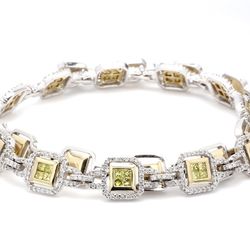 Necklace in 2-tone with rounds & 12 links of 2x2 princess cut fancy yellow diamonds.  D6.05ct.t.w.