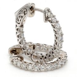 0.75' Inside out hoop earrings with shared prong set (24) round diamonds & with special spring lock.  D0.94ct.t.w.