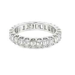 Eternity band in platinum with U-prong set (26) emerald cut diamonds.  D2.90ct.t.w.  Size 6