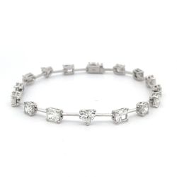 7' Bar style bracelet in 18K WG with basket prong set (16) multi-shape diamonds.  D8.23ct.t.w.