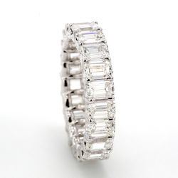Eternity band with shared claw U-prong set (22) emerald cut diamonds.  D4.32ct.t.w.  Size 4.5