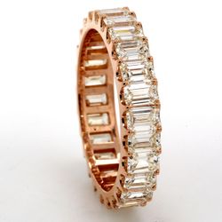 Eternity band in 18K RG with U-prong set (26) emerald cut diamonds.  D2.68ct.t.w.  Size 5.5