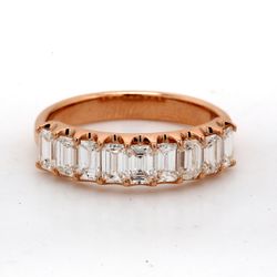 9-stone band in 18K RG with U-prong set emerald cut diamonds.  D1.11ct.t.w.  Size 5.5