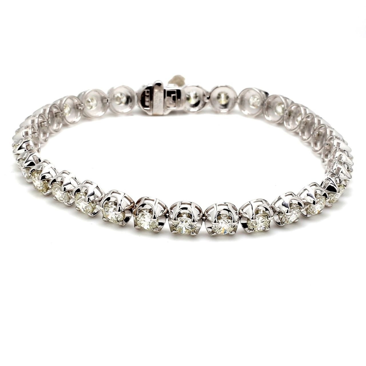 7' Tennis bracelet with crown head 4-prong set (30) round diamonds.  D8.47ct.t.w.