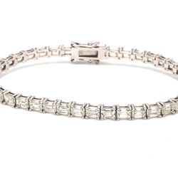7' Tennis bracelet east to west style with basket prong set (39) emerald cut diamonds.  D11.95ct.t.w.