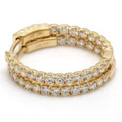 1' Inside out hoop earrings with prong set round diamonds.  D1.61ct.t.w.