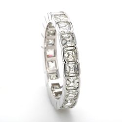 Eternity band in platinum with bezel set asscher cut diamonds.  D2.90ct.t.w.  Size 5.75