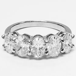 5-stone band with shared prong set oval cut diamonds.  D2.56ct.t.w.  Size 7