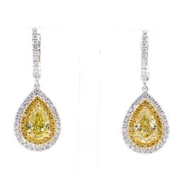 Halo dangling earrings in 18K WG with 3-prong set GIA certified FLY/VVS1-SI1 pear shape centers & prong set round diamonds.  D2.77ct.t.w.  (Centers 2.11ct.t.w.)