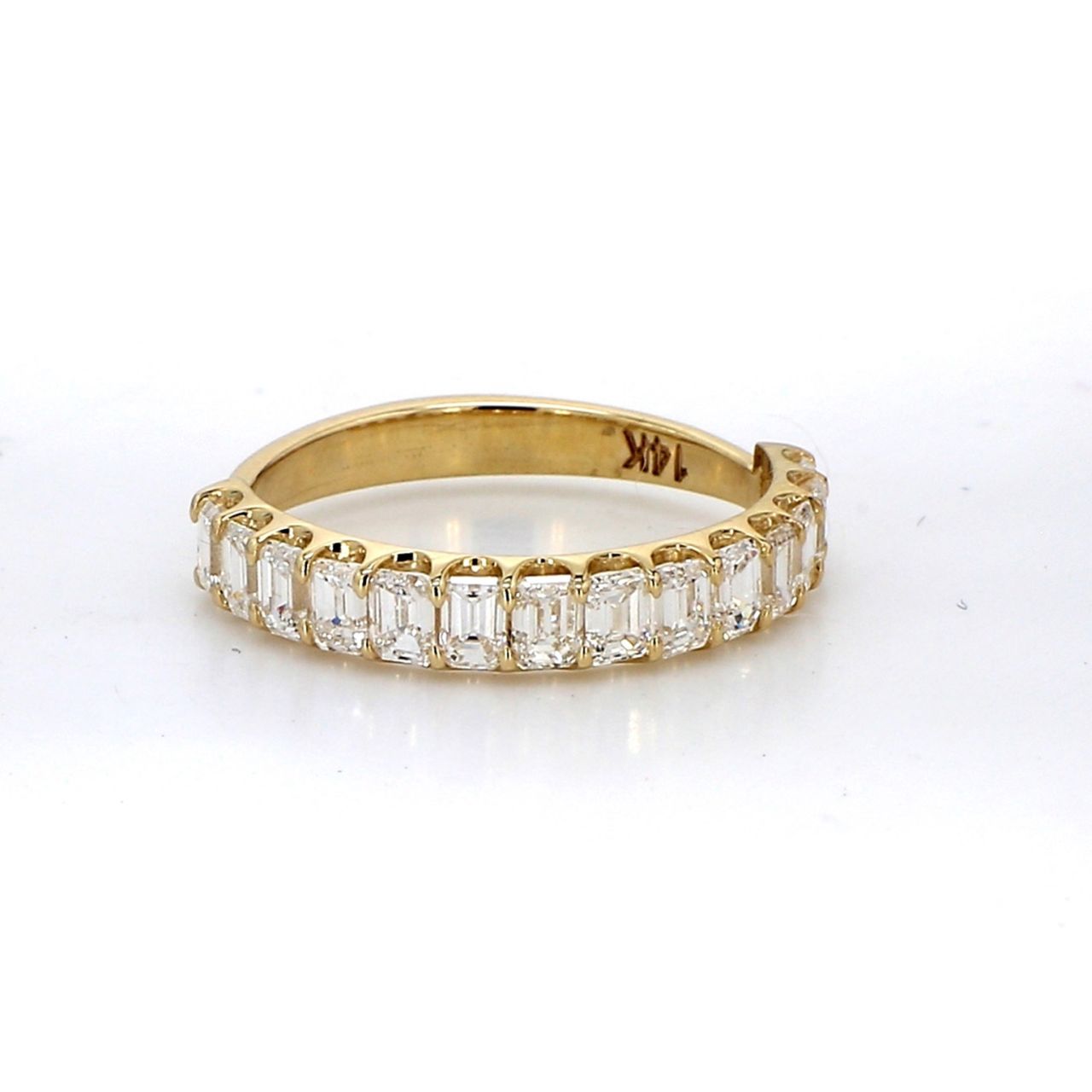 Halfway band in 14K YG with U-prong set (14) emerald cut diamonds.  D1.21ct.t.w.  Size 5.5