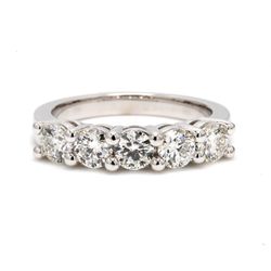 5-stone band with 4-prong set round diamonds.  D1.51ct.t.w.  Size 6.75