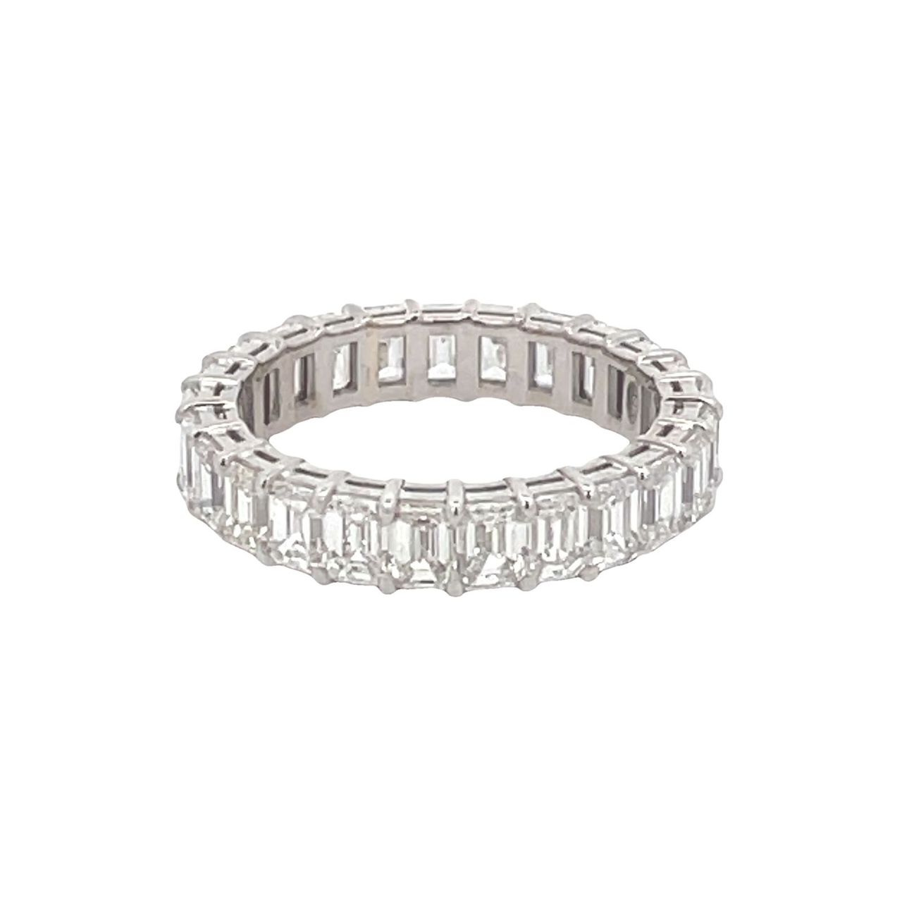 Eternity band in platinum with U-prong set (26) emerald cut diamonds.  D3.07ct.t.w.  Size 6