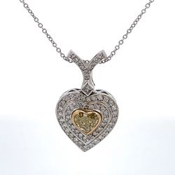 Double halo drop heart pendant with pave set rounds, square bezel set princess cut, & bezel set heart shape diamond center.  D1.37ct.t.w.