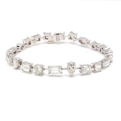 7' Tennis bracelet in platinum with prong set alternating assorted shape diamonds.  D11.43ct.t.w.
