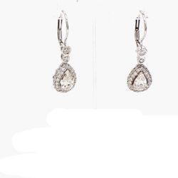 Halo dangling earrings with GIa certified E/SI2 pear shape centers and prong set round diamonds.  D2.40ct.t.w.