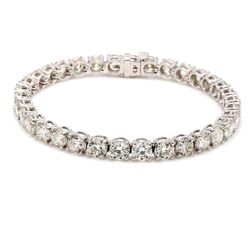 7' Tennis bracelet in platinum with basket prong set (34) round diamonds.  D17.03ct.t.w.