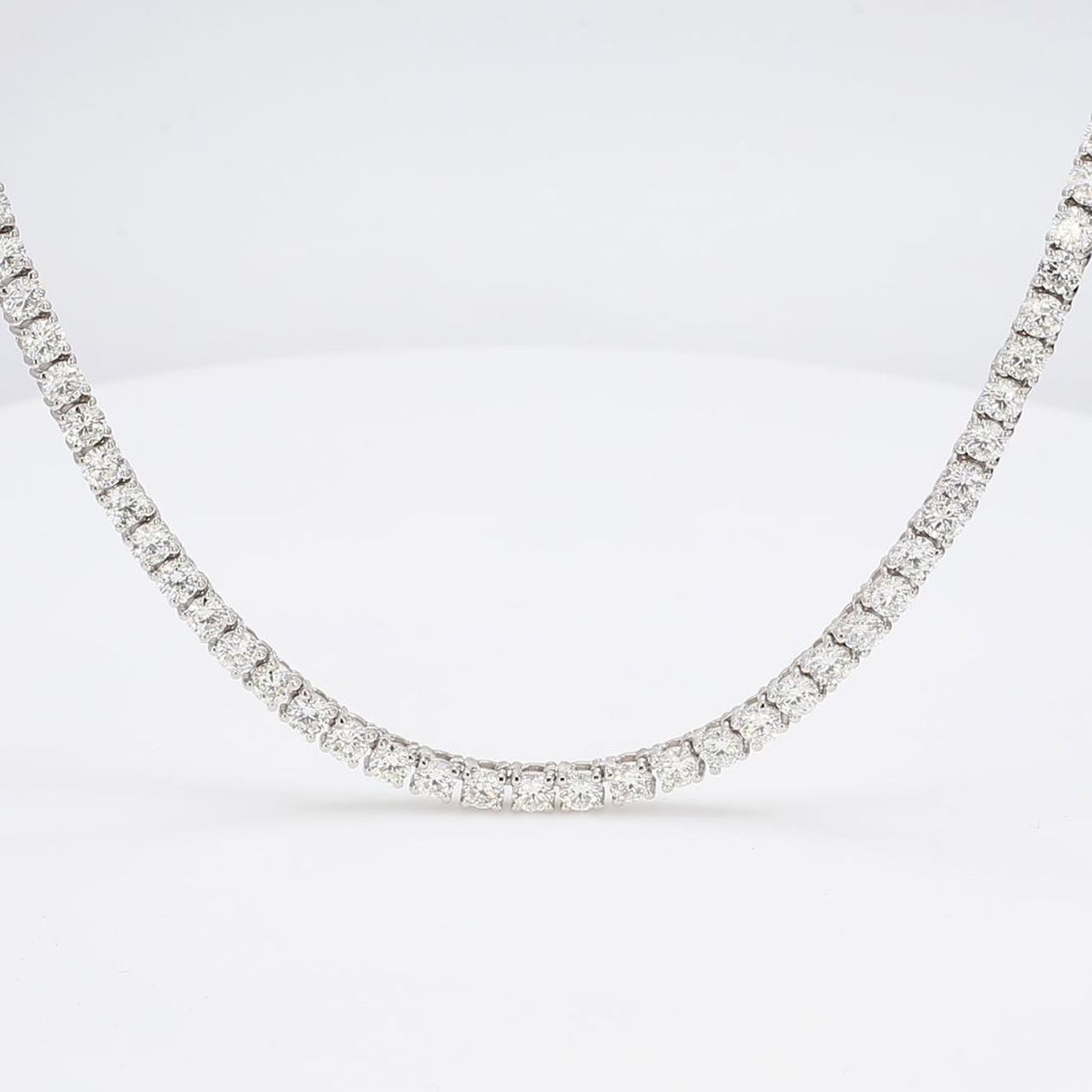 20' Tennis necklace with 4-prong set (211) round diamonds.  D6.98ct.t.w.