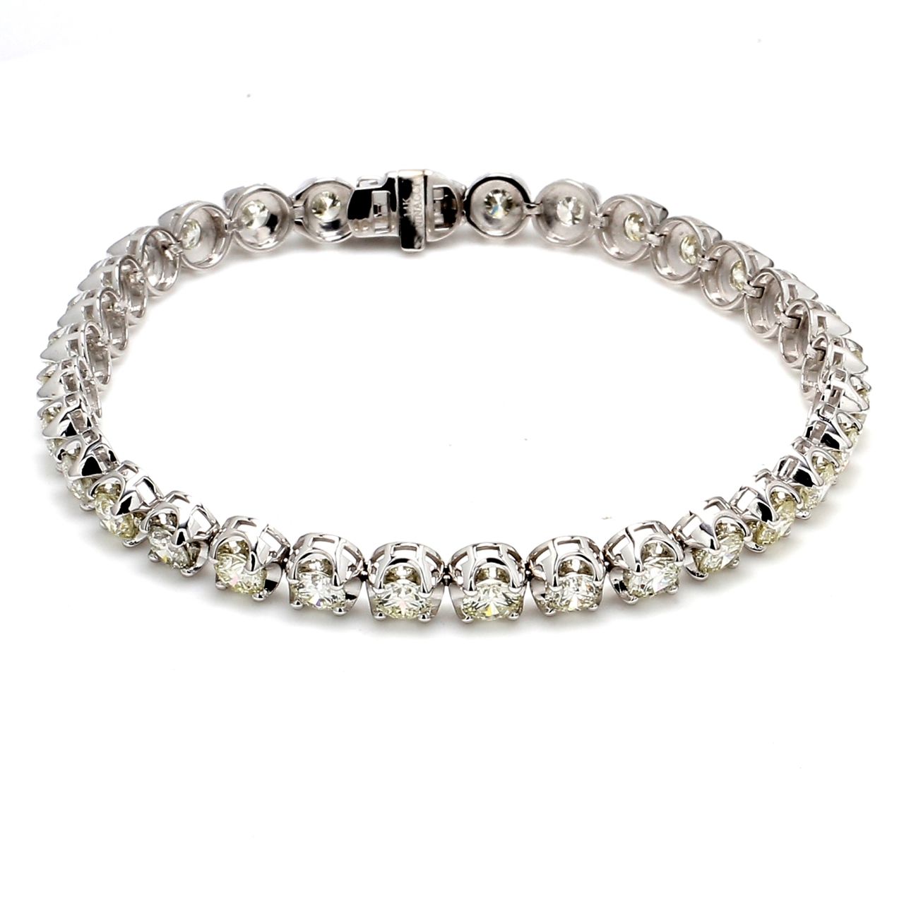 7' Tennis bracelet with crown head set (32) round diamonds.  D7.66ct.t.w.